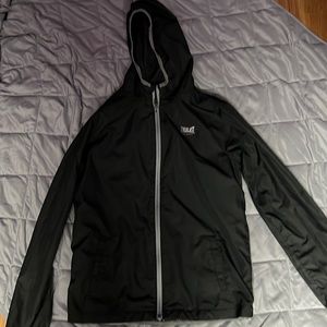 A black and gray zip up jacket. Size xl(14/16)